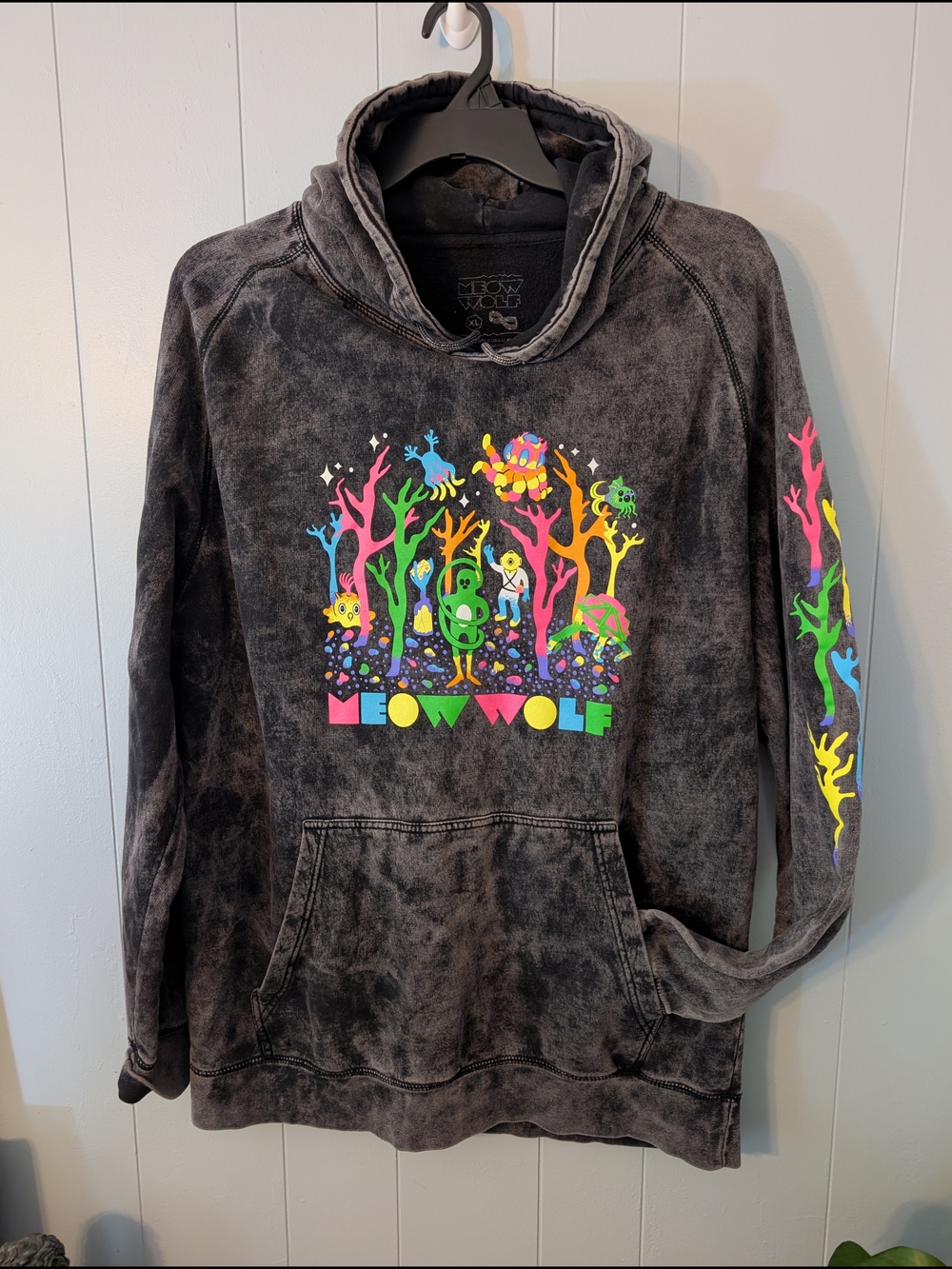 Meow Wolf Men's Black Mineral-Wash Hoodie with Neon Forest Graphic